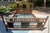 Stunning vintage bed by Baker Furniture! It features a king size rattan bed frame with bamboo accents and black leather...