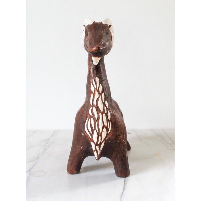 Vintage brown and white decorative ram figure by Brayton Luguna Pottery. Some age wear to painted finish. No chips.