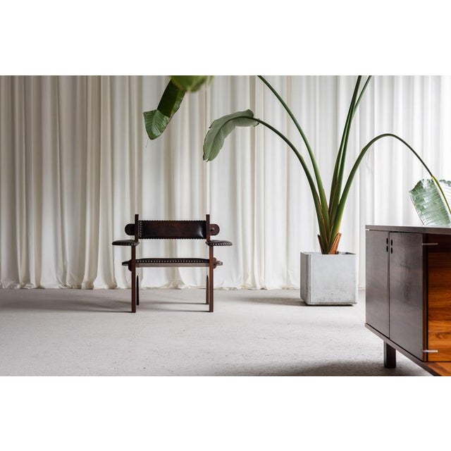 The brutalist armchair designed by Ernesto Valabrega in the 1950s is a striking piece of mid-century Italian...