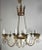This striking twelve-light chandelier, designed and made by Miamar Home in Los Angeles, captures the timeless charm of...