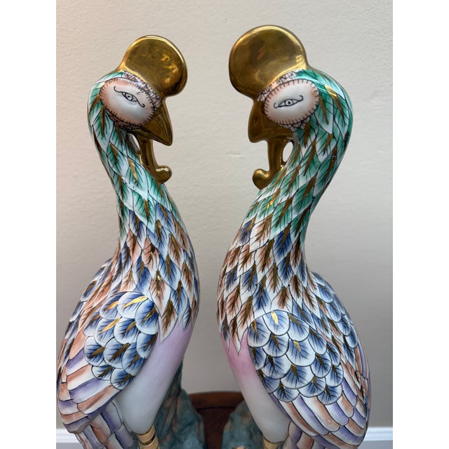 This is a beautiful pair of phoenix bird figurines hand painted with soft colors of blue, salmon and green. They have gold...