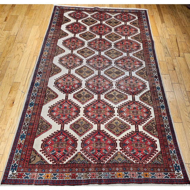 "Vintage Persian Malayer gallery rug. Hand-knotted in the early to mid-20th century. This beautiful rug features an...