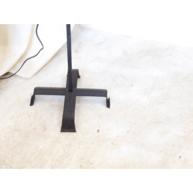 This small floor lamp comes with an Italian shield form shade and works well to direct the light toward a painting or...
