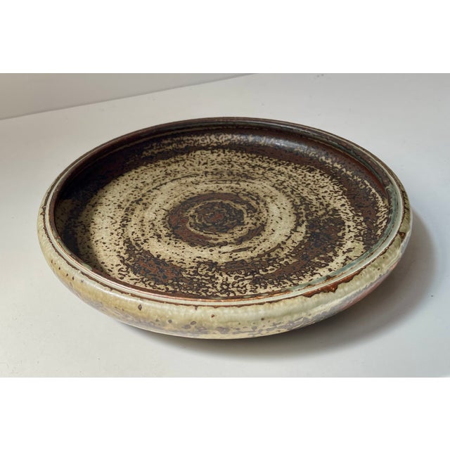 Sung glazed stoneware bowl/dish designed by the danish ceramist and Sculptor Carl Halier. Manufactured at Royal Copenhagen...