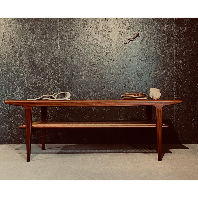 The stunning grain of the afrormosia wood and the beautiful design of the job made by john herbert for a younger ltd in...