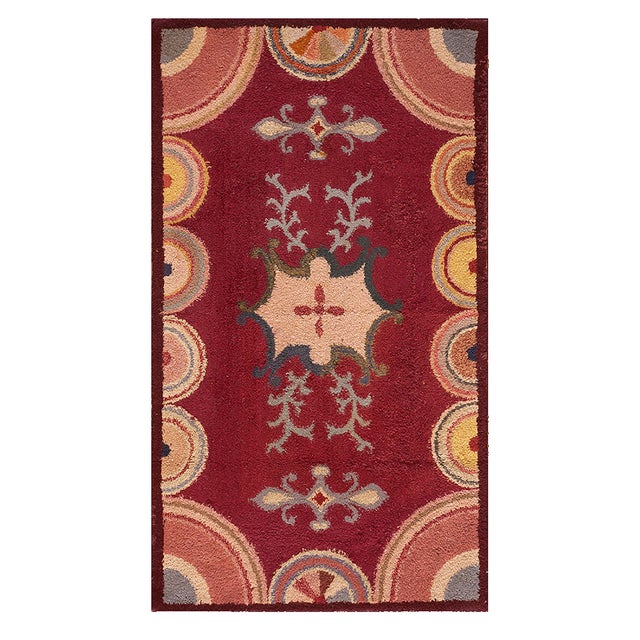 Antique American hooked rug, size: 2'6" x 4'6". Antique American Hooked Rug Small Scatter Size Wool Coral, Circa Date:...