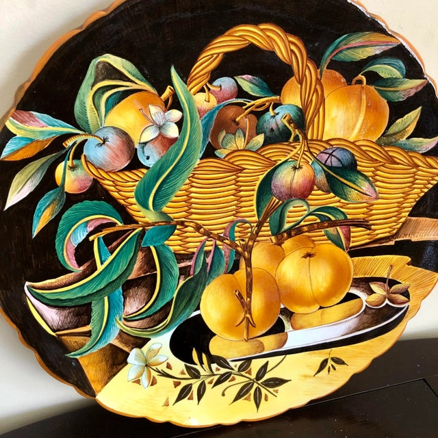 Early 20th century large Robbia Italy majolica wall charger with still life fruit basket scene. Great colors.