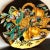 Early 20th century large Robbia Italy majolica wall charger with still life fruit basket scene. Great colors.