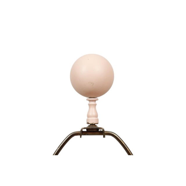 A pair of postmodern lamps by Pacific Coast dated 1991. Postmodern sculptural style vases in peach are cast with flowing...