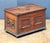 A handsome Continental rectangular iron-bound bullion (or strong) box or coffer chest of patinated walnut from the...