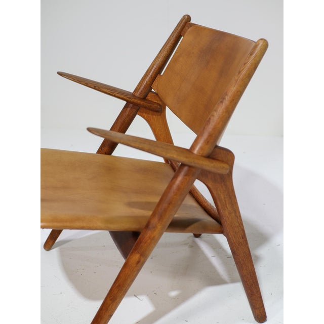Mid-Century Modern CH28 Lounge Chair in Oak and Cognac Leather by Hans J. Wegner, Denmark, 1950s For Sale - Image 3 of 17