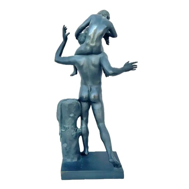 Italian 19th century Grand Tour Bronze Figure of Satyr With Infant Dionysus. The Satyr, often associated with music,...