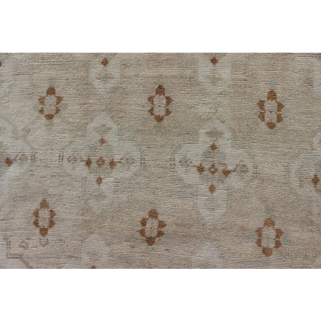 Muted Oushak Hand Knotted With All-Over Tribal Design in Light Tones of Taupe and Browns For Sale - Image 9 of 12