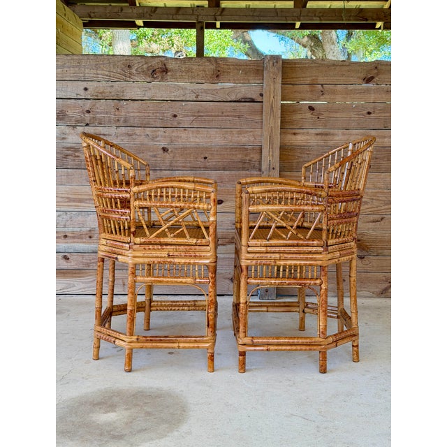 A stunning pair of vintage bamboo armchairs bearing the Thomasville by Atlas International label. Fully restored and...
