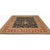 Traditional Handwoven Serapi Style Area Rug featuring an allover design in a black-colored field enclosed in a red-colored...
