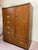 A gorgeous mid-century modern Hollywood Regency Campaign style armoire dresser or gentleman's chest By Drexel Heritage...