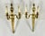 Elevate your home décor with this elegant pair of French brass sconces, dating back to the 1950s. Originating in France,...