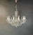 Glistening Bohemian-style chandelier, emanating captivating brilliance. This stunning piece is a brand-new, in-house...
