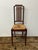 Design Plus Gallery presents an Antique Federal Revival Inlaid Wood Rush Seat Side Chair. The wood frame displays fine...