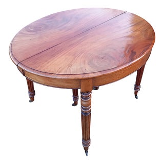 Oval Table with Three Extensions For Sale