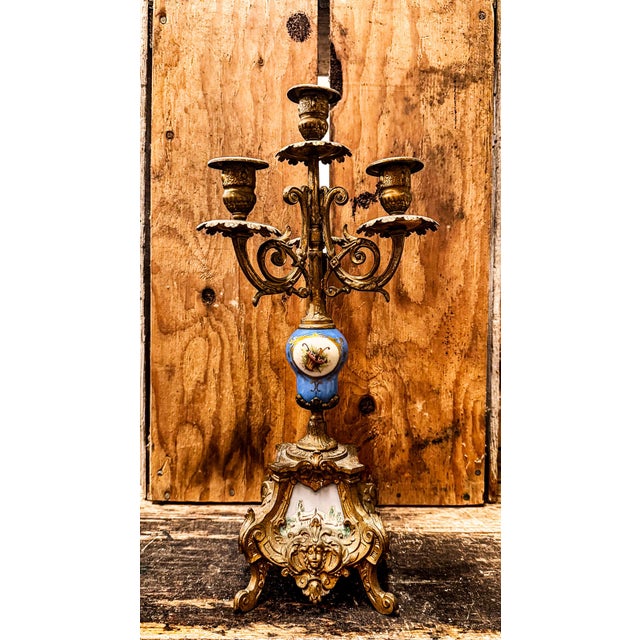 A 19th Century French porcelain candelabra by Rihouet, a leading producer of porcelain active in Paris during the first...