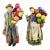 Vintage Old Man and Woman Balloon and Flower Sellers Figurines - 2 Pieces For Sale