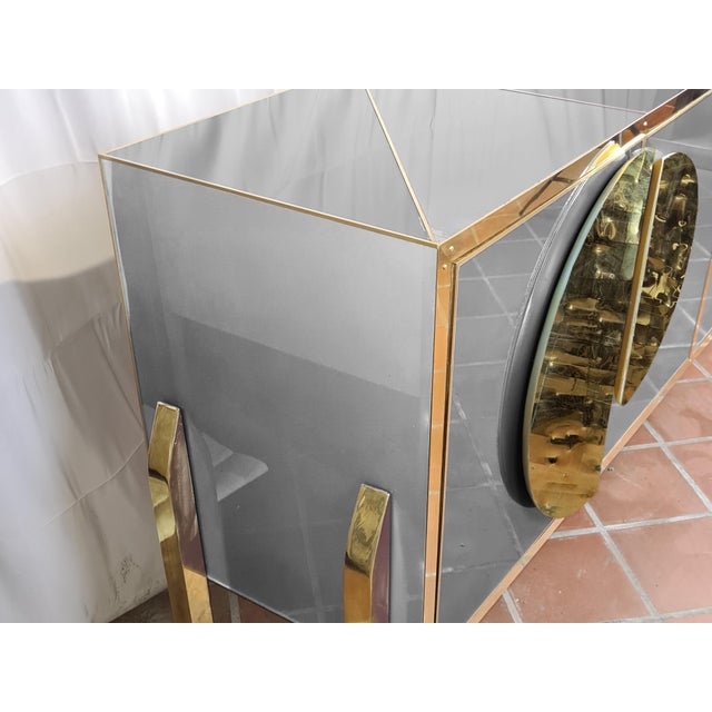 Handcrafted in Italy, it features an elegant birch frame embellished with beautiful grey Murano glass elements and elegant...