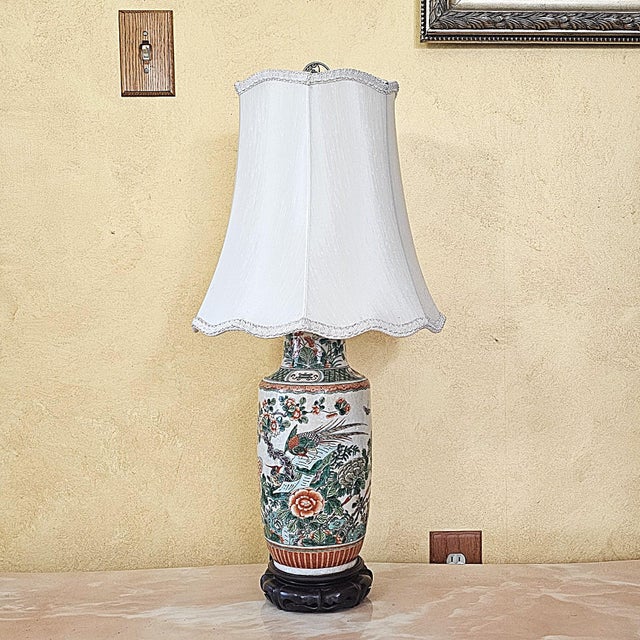 Vintage Chinese Famille Verte style porcelain table lamp featuring beautifully hand-painted birds, peonies, butterflies,...