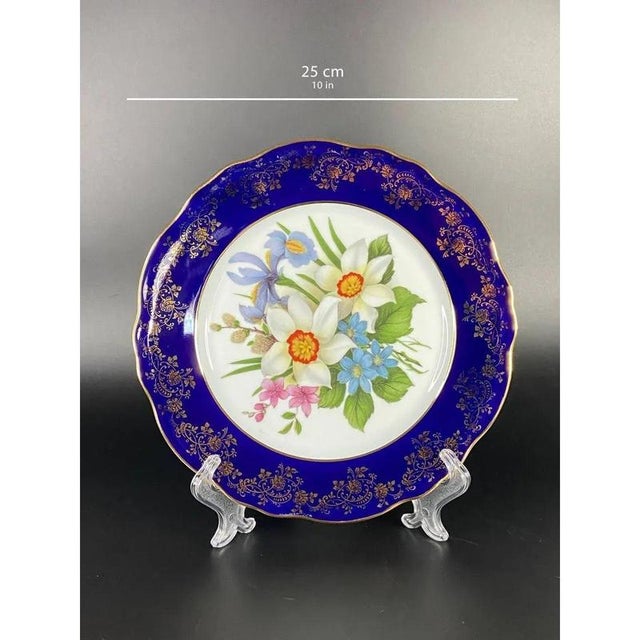 Magic cobalt blue and gold filigree. The deep, dark, blue background and the highly decorative gilded border accentuate...