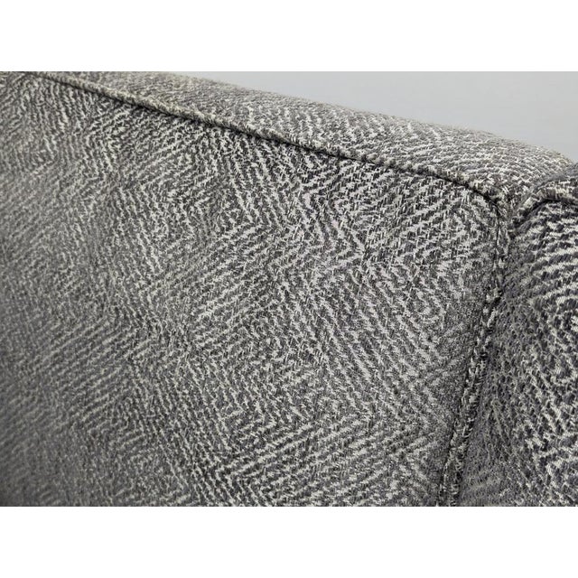 This gorgeous bespoke made corner sofa was designed with blends of white and grey in the sofa’s upholstery, giving a...