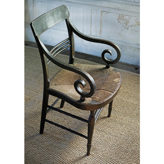 Antique wooden fancy chair with rush seat. Please note:rush seat has a bit missing (please see photos).