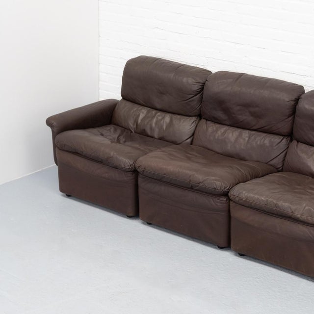 1970s modular sofa of German origin, composed of four separate elements. Defined by its wide, low seating and generously...