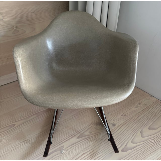 Stamped under the shell with serial number indicating that this chair belonged to a municipal institution; inventory label...