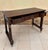 Elegant late 19th to early 20th century French Louis XVI console table crafted in solid oak and enriched with gilt-bronze...