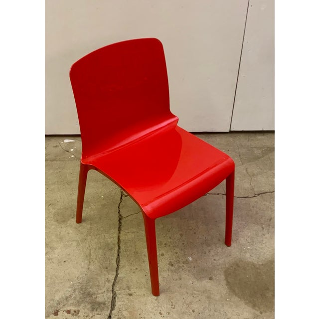 Set of 2 red tiffany chairs: These icons of Italian design, created by Marcello Ziliani in the 2000s, combine timeless...