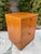 A heavy and solidly built Mid-Century Danish Modern teak filing cabinet with three drawers, the lower drawer with file...