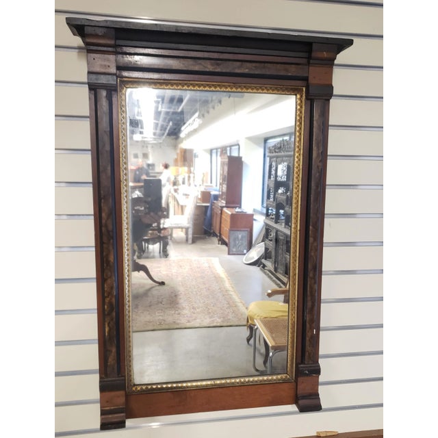 1890s American Classical Parcel Ebonized Mahogany Wall Mirror. Measures 35" in height and 24"W