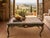 Decorative vintage low table or coffee table with a shaped rouge marble top, serpentine apron, cabriole legs, and hand-...