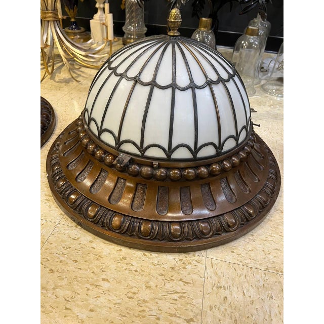 Circa 1900 Caldwell bronze base and leaded glass top flush mount with interior lights. Big size of light fixture