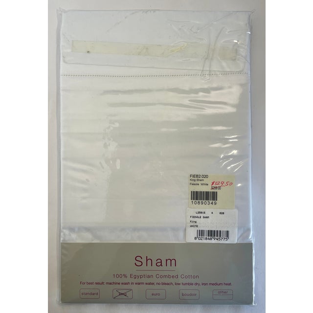 These are luxury-quality satin-weave king-sized shams made in Italy. They are white and have a 3” flange with a...
