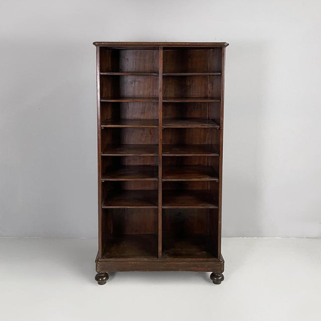Italian 19th century style wooden cabinet or bookcase, 1930s Open cabinet or bookcase made entirely of wood. The front...