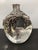 A splendidly designed Concave Flower Vase finished in silver. Designed and handmade in D'Argenta México. Unique piece by...
