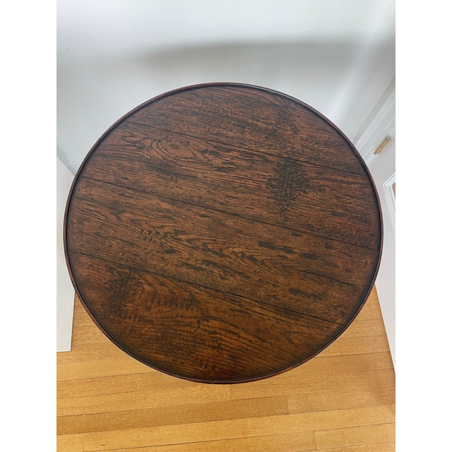 Theodore Alexander Cricket Table - Retails for: $1,654. A reclaimed oak veneered and mahogany cricket table, the circular...