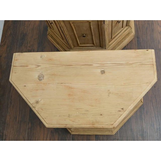 These 19th-century pine console cabinets embody the rustic elegance of country French design. Crafted with a striking...