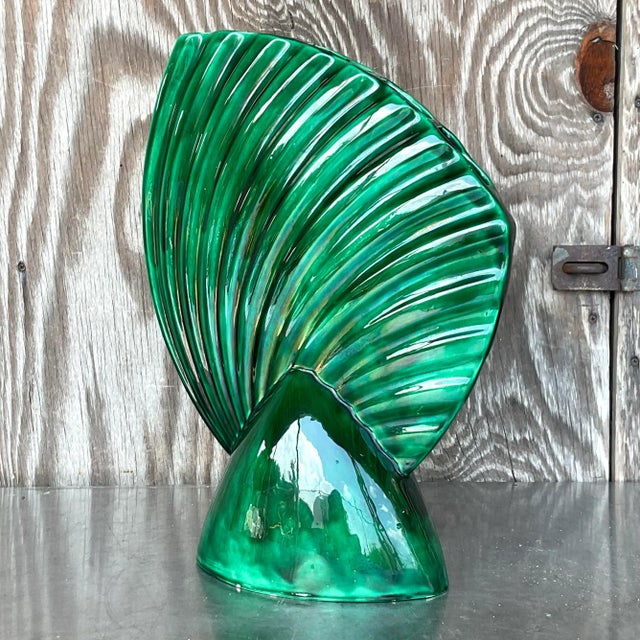 A stunning vintage MCM vase. A chic glazed ceramic gladiola vase in a deep green color. Just imagine the creative displays...