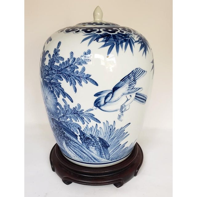 Mid-20th century Chinese blue and white porcelain ginger jar, finely painted in underglaze cobalt with a continuous garden...