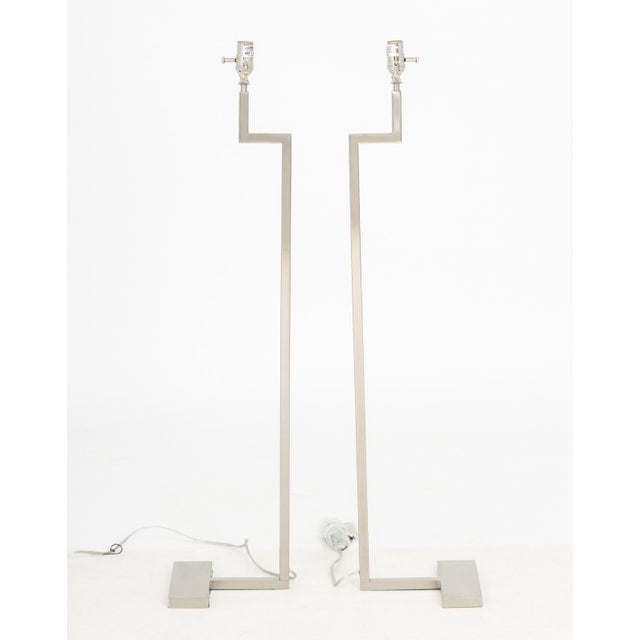 Pair of Cedric Hartman Style Chrome Floor Lamps. 42.75" H x 9" W x 9.25" D. Provenance: From a 500 Park Avenue Estate.
