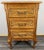 This elegant Vintage French Louis-style cabinet features classic carved detailing and graceful proportions. Its rich oak...