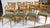 These vintage dining chairs are Heywood-Wakefield model M154 "Dog Bone" chairs, featuring a blonde maple finish and unique...