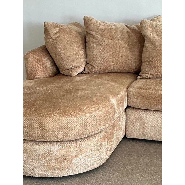 Experience the ultimate in relaxed luxury with this monumental U-shaped sectional sofa by the renowned manufacturer...